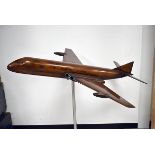 A large wooden model of an Avro Nimrod, possibly stained beech, the large model screws onto a