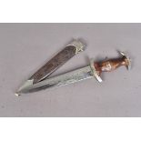 An early German SA dagger by Asso, with wooden handle with SA and eagle inlaid badges, white metal