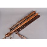 A Victorian turned wooden truncheon, with hand painted V.R. to the top with lower turned hand