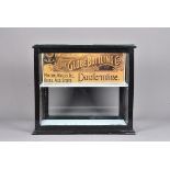 A Vintage table top display, with reproduction print for 'The Globe Bottling Co.' to the back, the