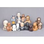 A collection of Winston Churchill busts, comprising of various mediums, including plaster, wood,