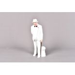 A Royal Doulton ceramic figure of Sir Winston Churchill, HN3057, Churchill in a white three piece