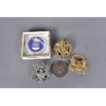 Two American badges, one possibly Silver plate, the other gilt with 'Howe' to the top, a