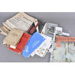 A collection of WWII and later ephemera, to include news papers, black and white photographs,