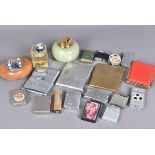 An assortment of pocket and table lighters, to include Colibri, Ronson, Gas Brotherlite, and more,