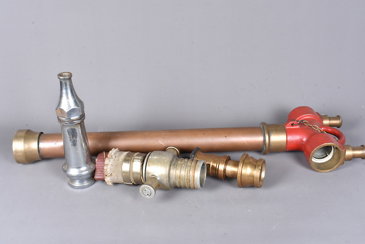 A WWII S Briggs & Co Fire Hose branch adaptor, dated 1939, together with a chromed fire nozzle