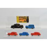 An unboxed scarce Tri-ang Minic 'Push and Go' Ford Escort 110E (Squire) model, approximately 12.