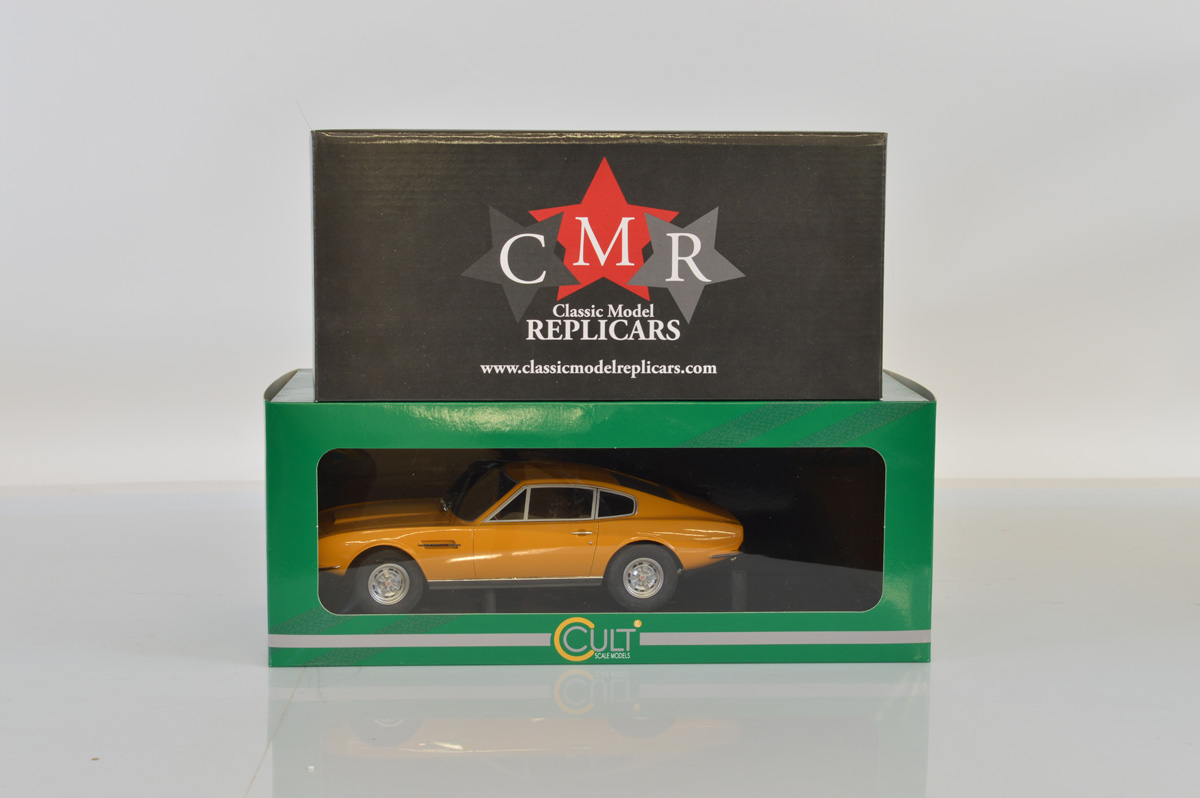 Two 1:18 scale Aston Martin DBS models, CMR Aston Martin DBS 1970 and Cult Aston Martin DBS, both