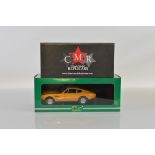 Two 1:18 scale Aston Martin DBS models, CMR Aston Martin DBS 1970 and Cult Aston Martin DBS, both