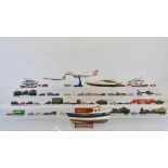 A large quantity of unboxed diecast models, together with a quantity of loose kit built and