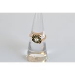 A 9ct gold pearl and chrysoprase crossover cluster ring, with textured flame-like mount, 3.2g. UK