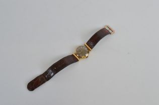 A 9ct gold WW2 era Condex diver's watch, with silvered dial, Arabic numbers and second subsidiary