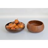 Two turned wood fruit bowls, 30cm and 25cm diameter respectively. Together with a quantity of mostly