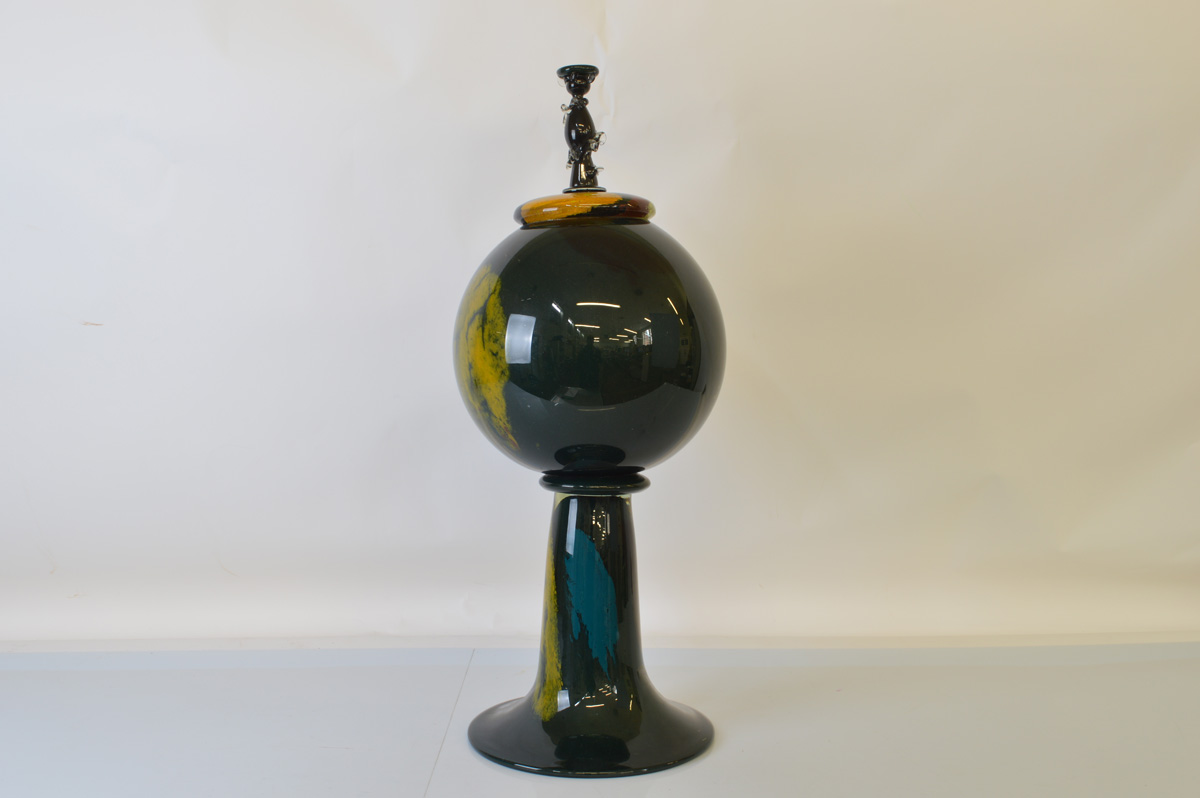 A large studio art glass sculpture, of globe form with flared base, standing 73cm tall.