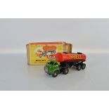 A boxed Tri-ang #223M Minic No.3 Bedford 'Push and Go' Shell Articulated Petrol Tanker in green