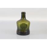 A green glass flask, long neck, slightly waisted, EIIR 1947-1972 seal, 20cm high