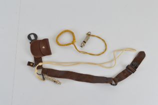 A J. Hudson ARP whistle with tassel, together with an Acme Scout whistle with leather scouting belt