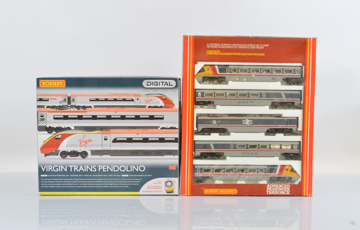 Two Hornby OO gauge model railway train sets, Advanced Passenger Train Pack and DCCReady R2467X