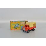 A boxed Tri-ang Minic Bedford 'Push and Go' #365M Express Delivery Van in red and cream, VG, with