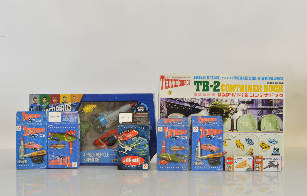 A collection of Gerry Anderson themed model kits and models, including an Aoshima 1:350 scale