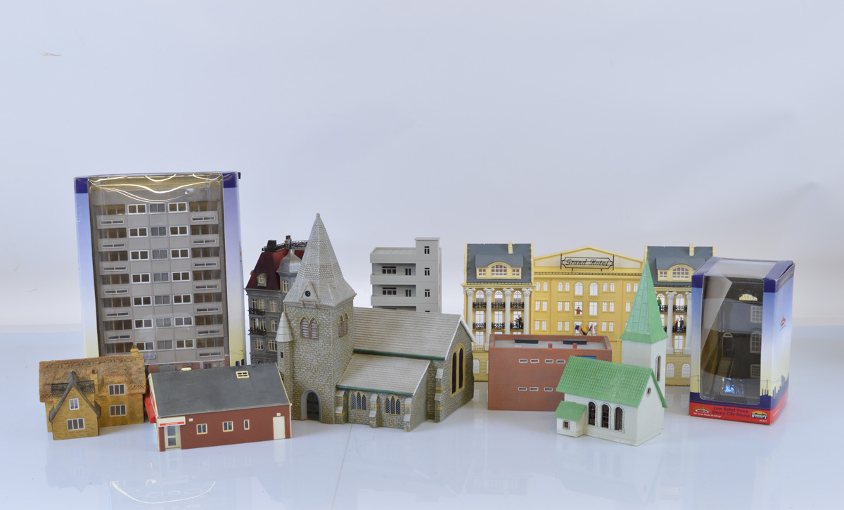 A large quantity of model railway buildings, including card built, plastic, resin and kit built