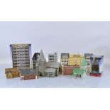 A large quantity of model railway buildings, including card built, plastic, resin and kit built