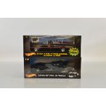 Two Hotwheels 1:18 scale Batmobile models, Batman Returns Batmobile and Batman Classic TV Series