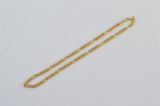 An 18ct gold figaro link chain, stamped 18ct to clasps. 40.5cm long. 13.0g
