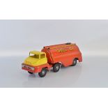 A hard to find unboxed Tri-ang Pressed Steel Thames Trader Articulated Tanker model in red and