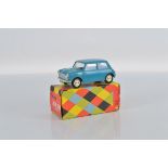 A scarce boxed Tri-ang Minic M020 1/20th scale Austin Seven Mini, motorised model in blue, with