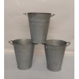 A vintage set of three galvanised twin handled flower buckets, tapered form, 34 cm high by 36.5cm