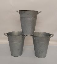 A vintage set of three galvanised twin handled flower buckets, tapered form, 34 cm high by 36.5cm