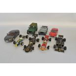 Eight 1:18 scale diecast models, including Quartzo, Minichamps, Anso, Welly, Universal Hobbies and