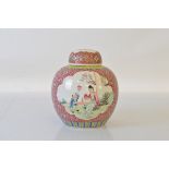 An early 20th century Chinese ginger jar and cover, with pink and yellow enamel tones, 19cm tall