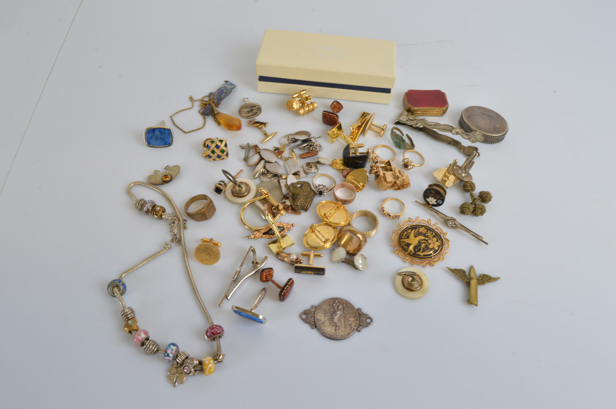 A collection of costume jewellery, including silver gilt gem set cluster ring, gold shell buckle