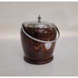 An early 20th century stained oak and chromed biscuit barrel, with swing handle and lift off lid,