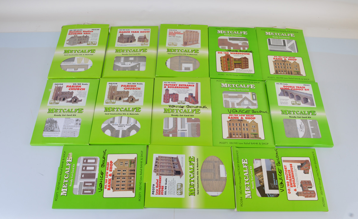 A good quantity of Metcalfe model railway building kits, including Bank & shop, Warehouse,