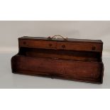 A large late 19th early 20th century stained pine tool box, rectangular form with brass brackets and