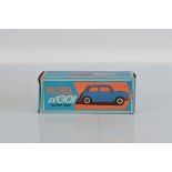 A very scarce boxed Tri-ang 1/20th scale Austin Mini model, a W20 'Pull Back n' Go' Super Mini in