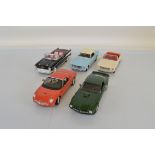 Five 1:18 scale diecast models, all of classic American cars including Revell, Ertl, Mira, Welly,