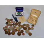 A small collection of British and World coinage, together with a string of Ciro pearls in box, a