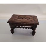 a 19th century carved wooded stool, stained oak, with turned supports, 30 cm