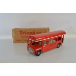 A hard to find boxed Tri-ang Pressed Steel TM3910 Single Decker Bus model in red, approximately 56cm