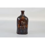 A Victorian treacle glazed flask, having relief female profiles to either side, 23cm high