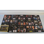 A collection of sixteen set of James Bond film cells, all set into card frames from various films