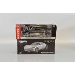 Two 1:18 scale James Bond 007 Aston Martin models, Hotwheels Elite Spectre Aston Martin DB10 and