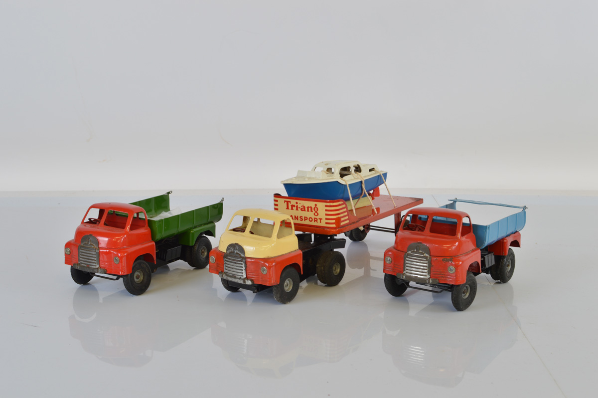 Three unboxed Tri-ang Minic Bedford vehicles, including a #222M Articulated Transport Lorry in red