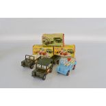 Three boxed Tri-ang Pressed Steel Land Rover models from their 'Hi-Way' range of toys including Army