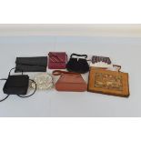 A collection of ladies handbags, including a snakeskin example with purse on safety chain, evening