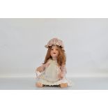 A Porzellanfabrik Burggrub bisque head baby doll, stamped 169 Special-7 stamped to back of head,